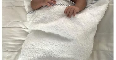 Kenya Moore First Moments Holding Baby Brooklyn
